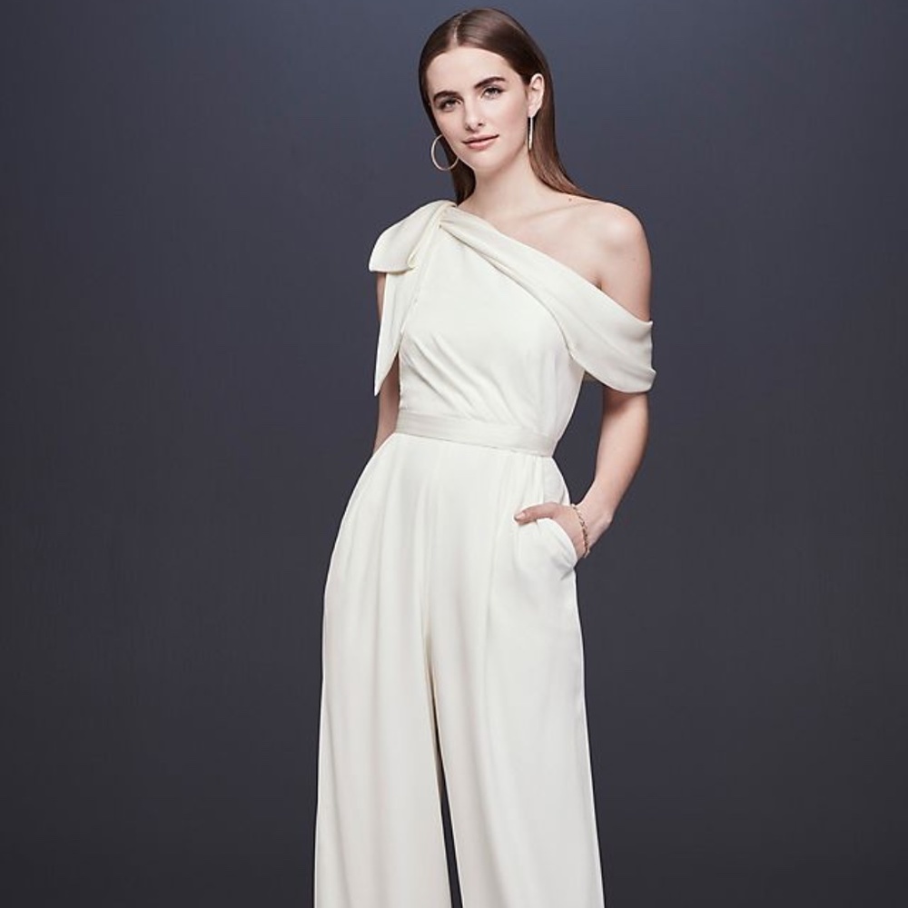 One-shoulder crepe white jumpsuit with bow
